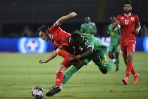 Ayman Ben Mohamed in action in the Africa Cup of Nations semi-final Ayman Ben Mohamed in action in the Africa Cup of Nations semi-final